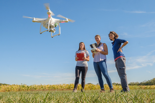 amelie and students with drone