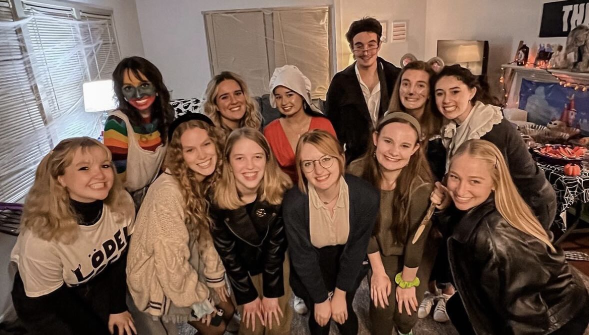 Members of Sigma Tau Delta gather for their annual Halloween event.