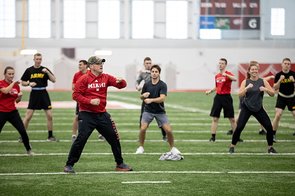 students exercising with Greg and Renate Crawford