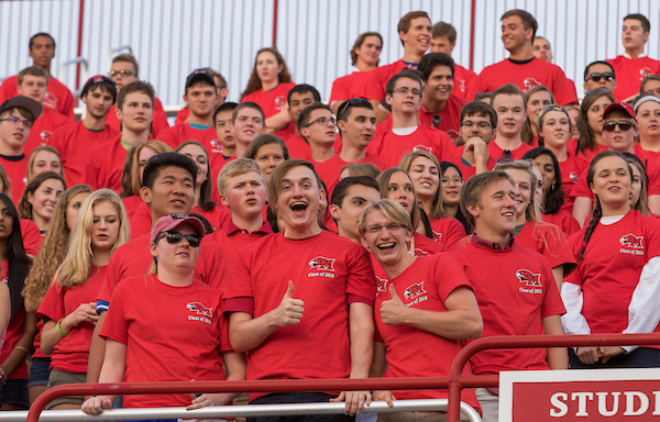 A crowd of students in the Student Section at a football game.